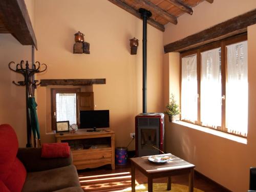 TV a/nebo společenská místnost v ubytování Apartamentos Top Medieval