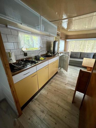 Dapur atau dapur kecil di Ośrodek Wypoczynkowy Głębokie 4