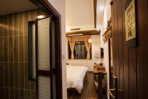 Koupelna v ubytování Hotel California Zhangjiajie