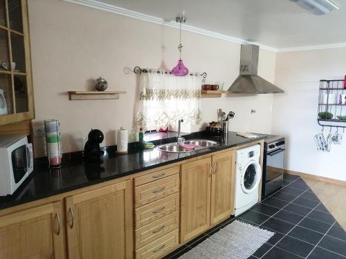 Afbeelding uit fotogalerij van Apartamento Solar dos Castanheiros in Prainha de Baixo