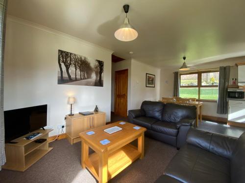 A seating area at Bracken Lodges, Loch Tay, Linnie Lodge