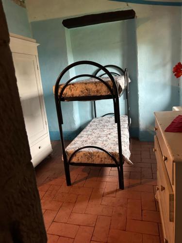 Ein Bett oder Betten in einem Zimmer der Unterkunft BORGO IN SAN ANGELO