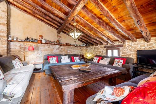 Zona de estar de Can Miqueló - casa rural 16 hòstes