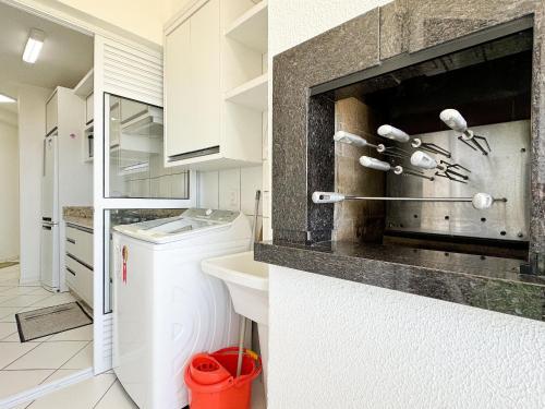 Dapur atau dapur kecil di Resid. Clube Mar Grosso - Laguna - LAG100