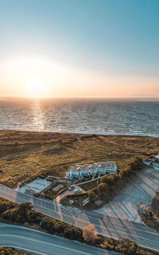 an aerial view of a resort next to the ocean at Kamiros Apartment in Kalavárda