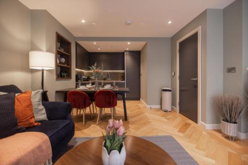 a living room with a couch and a table at King's 23 in York
