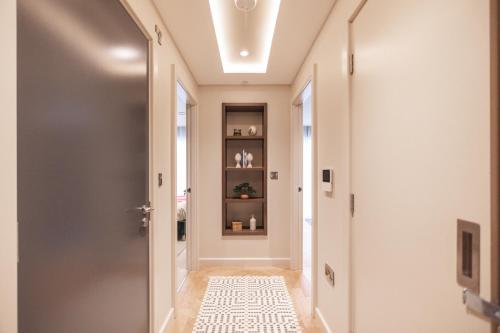 a hallway with a door and a tile floor at King's 23 in York