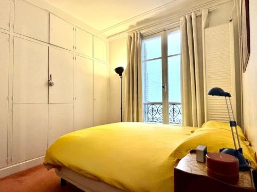 Легло или легла в стая в Charmant appartement 2P Proche Arc de Triomphe