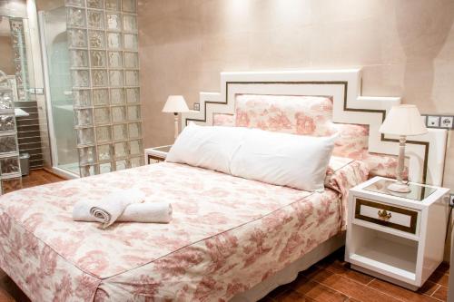 Uma cama ou camas num quarto em El Conde de la Mezquita ComoTuCasa
