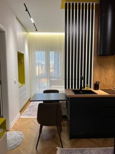 Køkken eller tekøkken på Sun Cane Apartment
