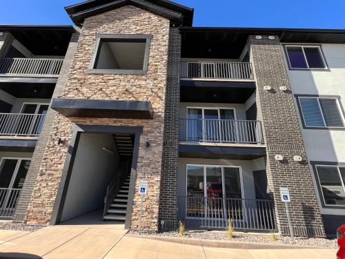 an apartment building with a large garage at Fish Lake Suite - Castle Rock Condos in Richfield