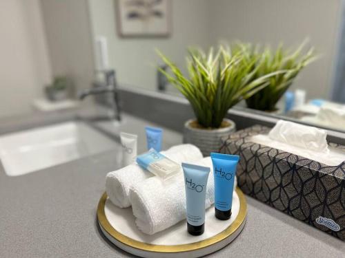 a bathroom with towels and toothbrushes on a counter at Sunset Suite - Castle Rock Condos in Richfield