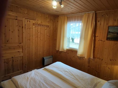 Postel nebo postele na pokoji v ubytování Kleine Freiheit- Nummer 1