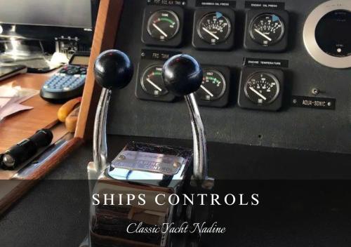 a close up of the controls of an airplane at Classic Yacht Nadine in Poole Harbour, Dorset, with a Hot Tub Jacuzzi in Poole