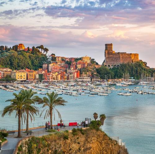 a view of a harbor with boats in the water at La casa di Carlotta in Ceparana