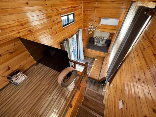an overhead view of a room in a wooden cabin at Tiny House - mountain views close to everything in Valley Center