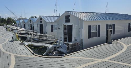 a row of houses on top of a dock at Yacht Haven in Marathon
