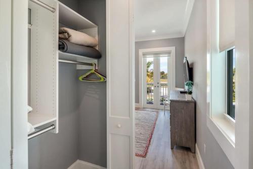 a hallway of a home with a living room at Waterlane House -Pool & Boat Dock in Stock Island