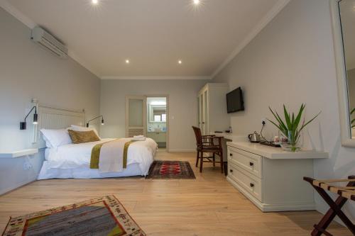 Voodi või voodid majutusasutuse Belvedere Boutiqe Hotel toas