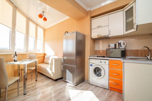Kuchyň nebo kuchyňský kout v ubytování MiMi Rent & Lev Tolstoi Apartaments