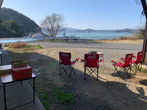 a group of chairs and a table and a table and a table and a table at Hibisha - Vacation STAY 66595v in Amakusa