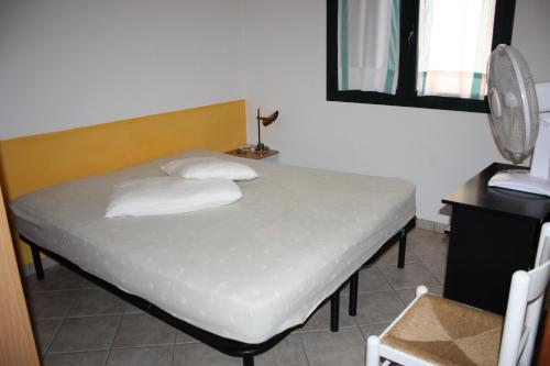 Postel nebo postele na pokoji v ubytování Casa di Nanni