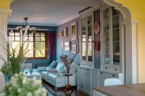 a living room with a couch and a table at Chalet Bilbao-Aeropuerto in Sondika