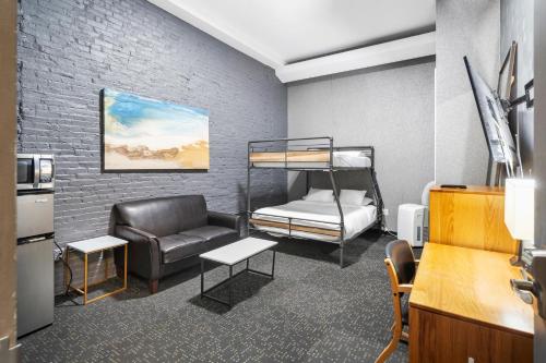 Ένα ή περισσότερα κρεβάτια σε δωμάτιο στο Temple Place Suites 2+3