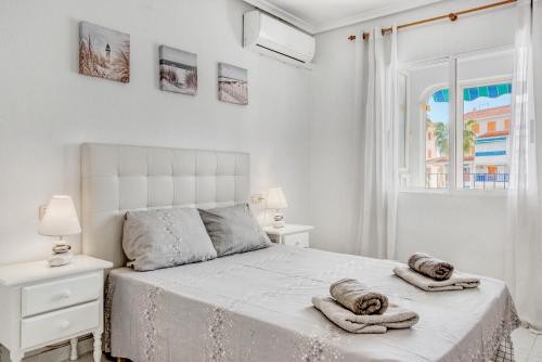 Postel nebo postele na pokoji v ubytování Playa La Mata