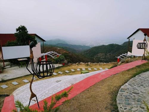 a red carpeted path with a view of a mountain at SalberrybyJJR in Lansdowne