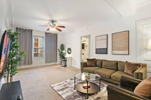 a living room with a couch and a table at Sleek 1-Bedroom Apt in Chicago - East Park Tower 0610 rep in Chicago