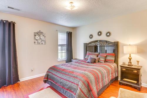 a bedroom with a bed and a window at Cozy Family Retreat about 10 Mi to Downtown Birmingham in Brighton