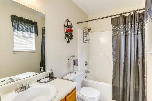a bathroom with a sink and a toilet at Cozy Family Retreat about 10 Mi to Downtown Birmingham in Brighton