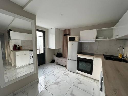 Η κουζίνα ή μικρή κουζίνα στο Maison MAIA Créteil-Paris