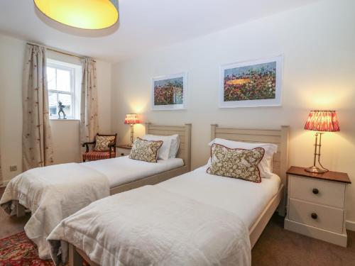 Кровать или кровати в номере Steading Cottage - Craigievar Castle