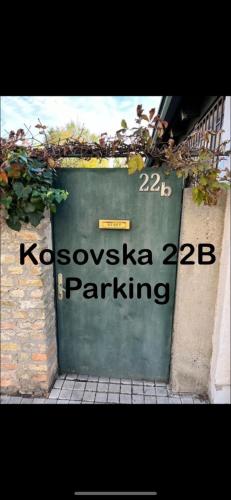 a green door with the words kosciuszko parking at Sobe sa sopstvenim KUPATILOM Private rooms bathroom In CENTER in Novi Sad