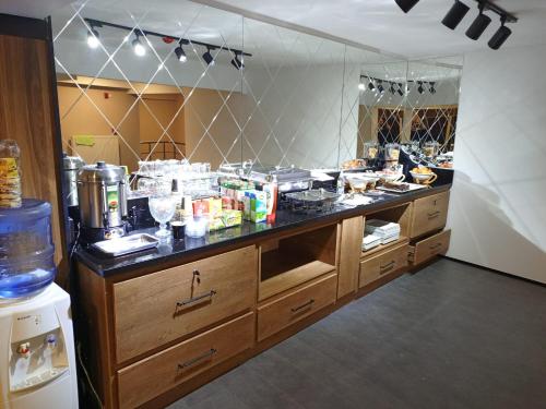 Η κουζίνα ή μικρή κουζίνα στο Fidanoglu Suite Hotel
