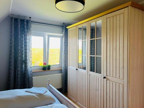 Postel nebo postele na pokoji v ubytování Ferienhaus Liese