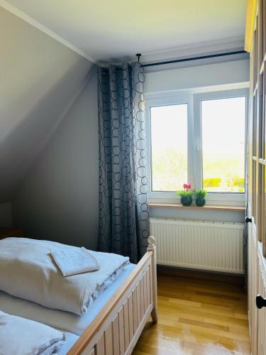 Postel nebo postele na pokoji v ubytování Ferienhaus Liese