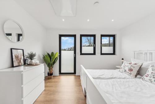 Luxury Maisonette - Haus Seiters - 4 Sterne mit Saunaにあるベッド