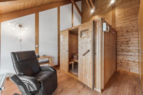 Luxury Maisonette - Haus Seiters - 4 Sterne mit Saunaにあるシーティングエリア