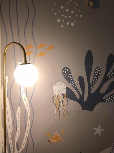 a wall mural of an octopus and an aquarium at Amazing Newly Renovated Atlantica Condo on the 9th flloor in Myrtle Beach