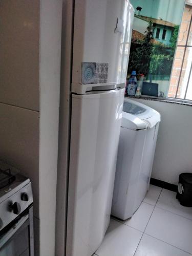 Η κουζίνα ή μικρή κουζίνα στο Apt. aconchegante Melhor Localização do Centro: conforto e praticidade