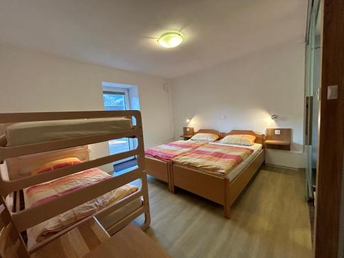 Katil atau katil-katil dalam bilik di Apartments Mrakič