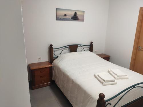 Ένα ή περισσότερα κρεβάτια σε δωμάτιο στο Radu House