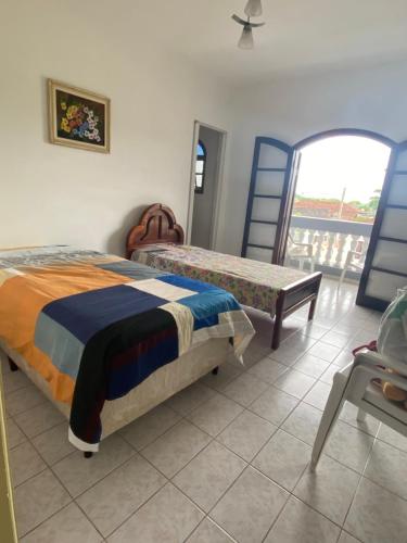Casa Canto do Morro - Iguape房間的床