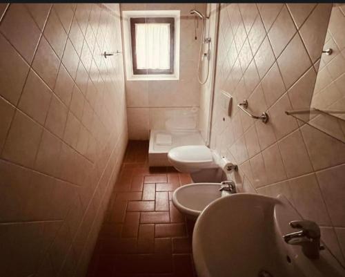 Phòng tắm tại LOCANDA PODERE LE VIGNE