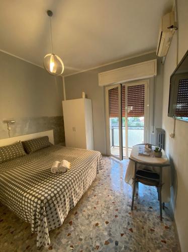 Кровать или кровати в номере Casa Albergo