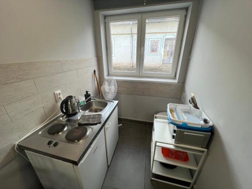Η κουζίνα ή μικρή κουζίνα στο Maláta Homes