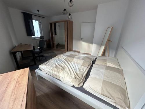 Ένα ή περισσότερα κρεβάτια σε δωμάτιο στο Modern apartment in Nuppu complex with free parking